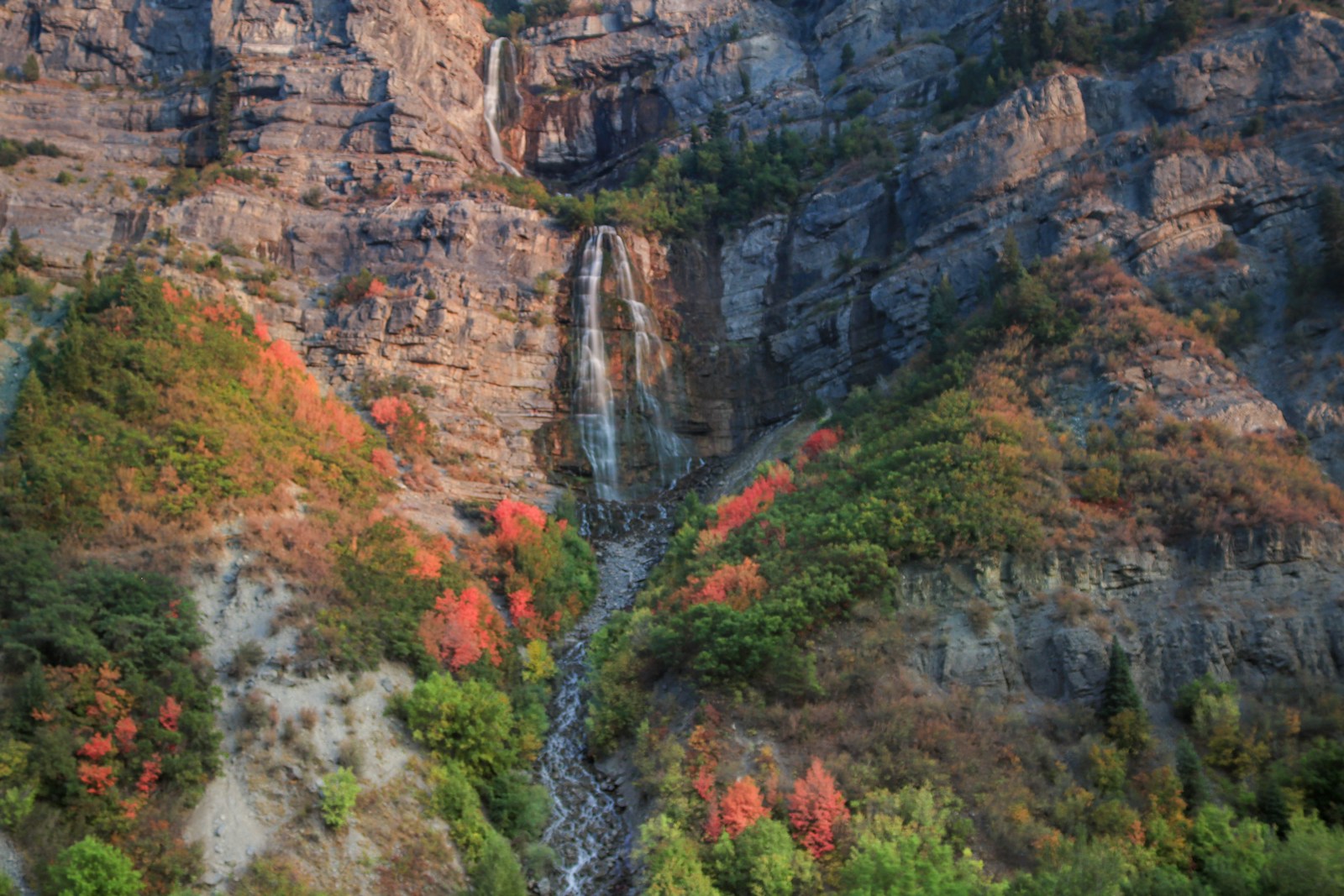 Bridal Veil Falls double cascade dropping down the cliff face in Provo Canyon, Utah County