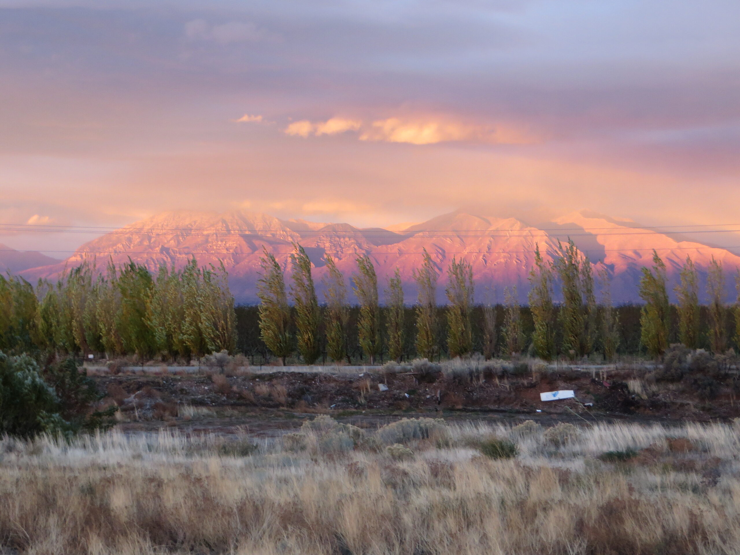 Misty sunset over the Wasatch Mountains near Santaquin, Utah
