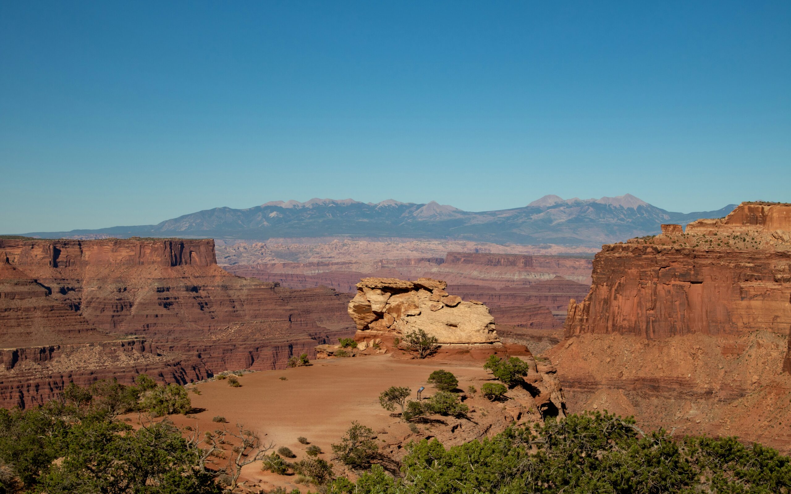 Shafer Canyon Overlook in Canyonlands Island in the Sky district with the switchbacking Shafer Trail Road carved into the red cliffs