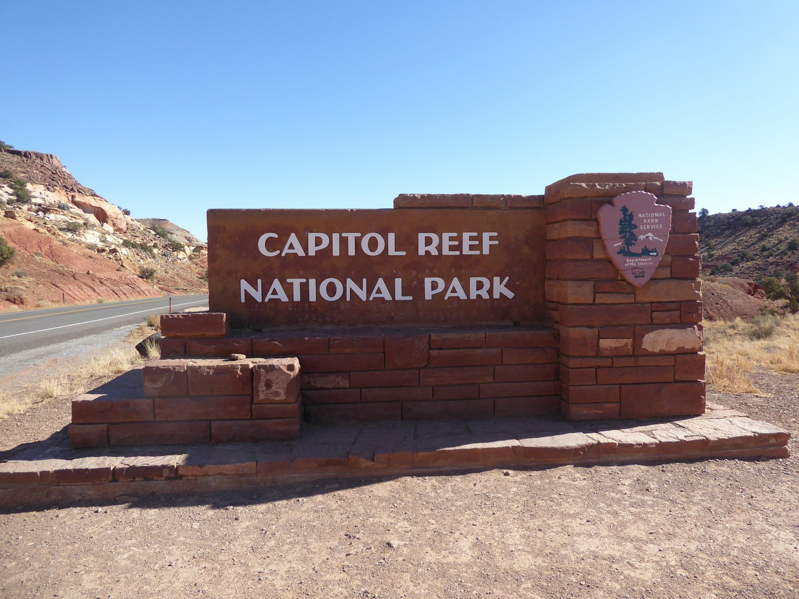 Capitol Reef National Park entrance sign along Highway 24 near Torrey, Utah