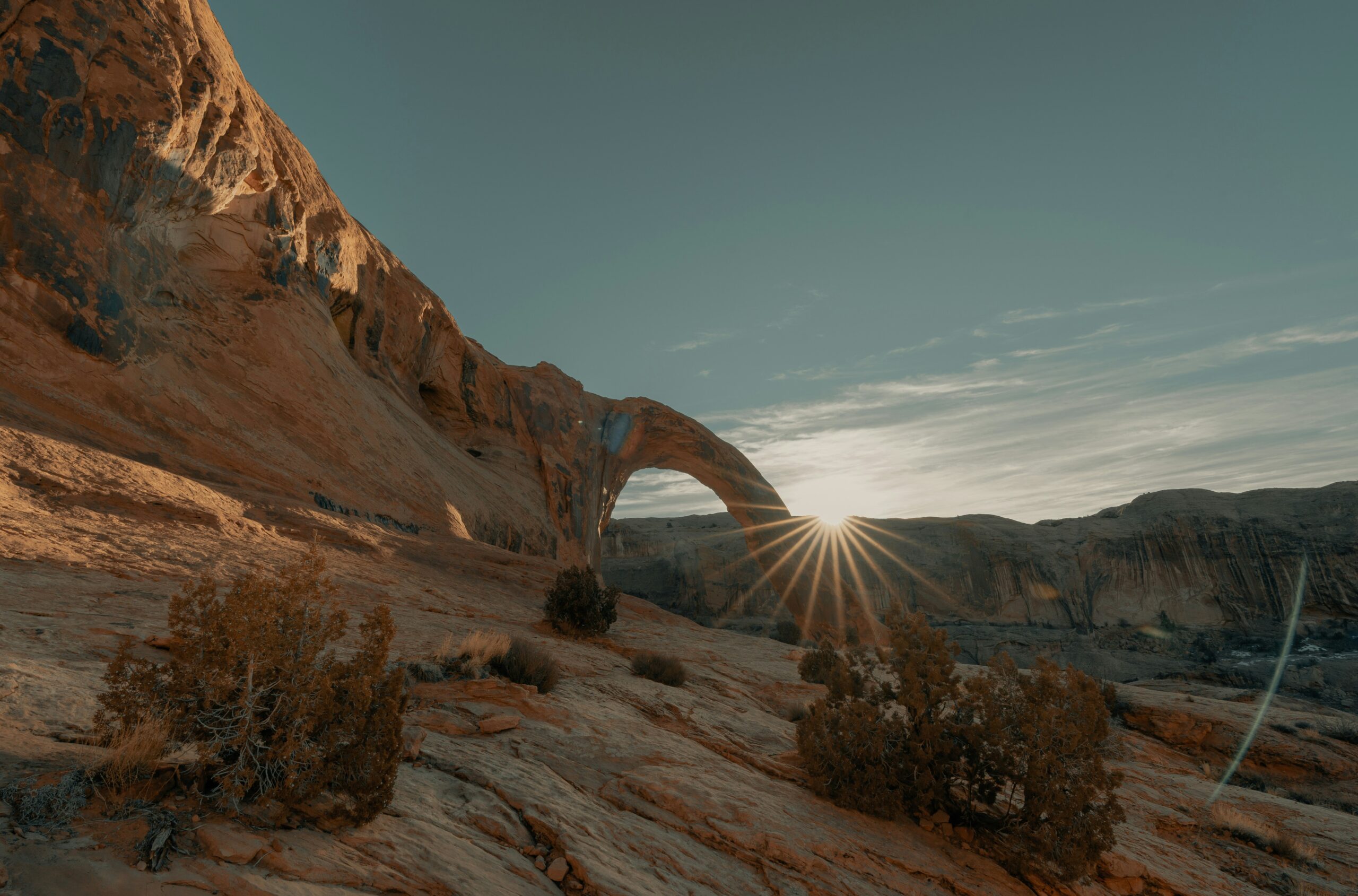 Corona Arch at sunrise on the free BLM trail outside Moab, Utah