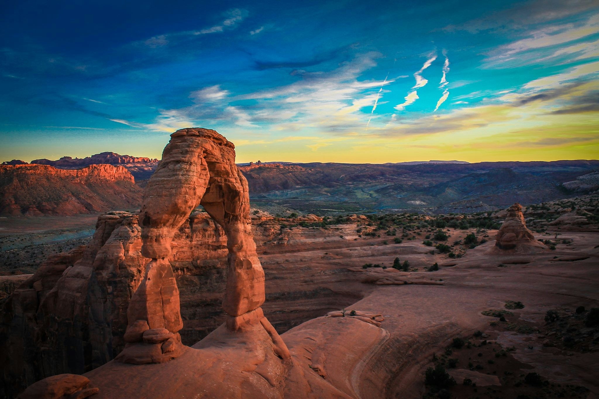 Delicate Arch glowing at sunset in Arches National Park near Moab, Utah