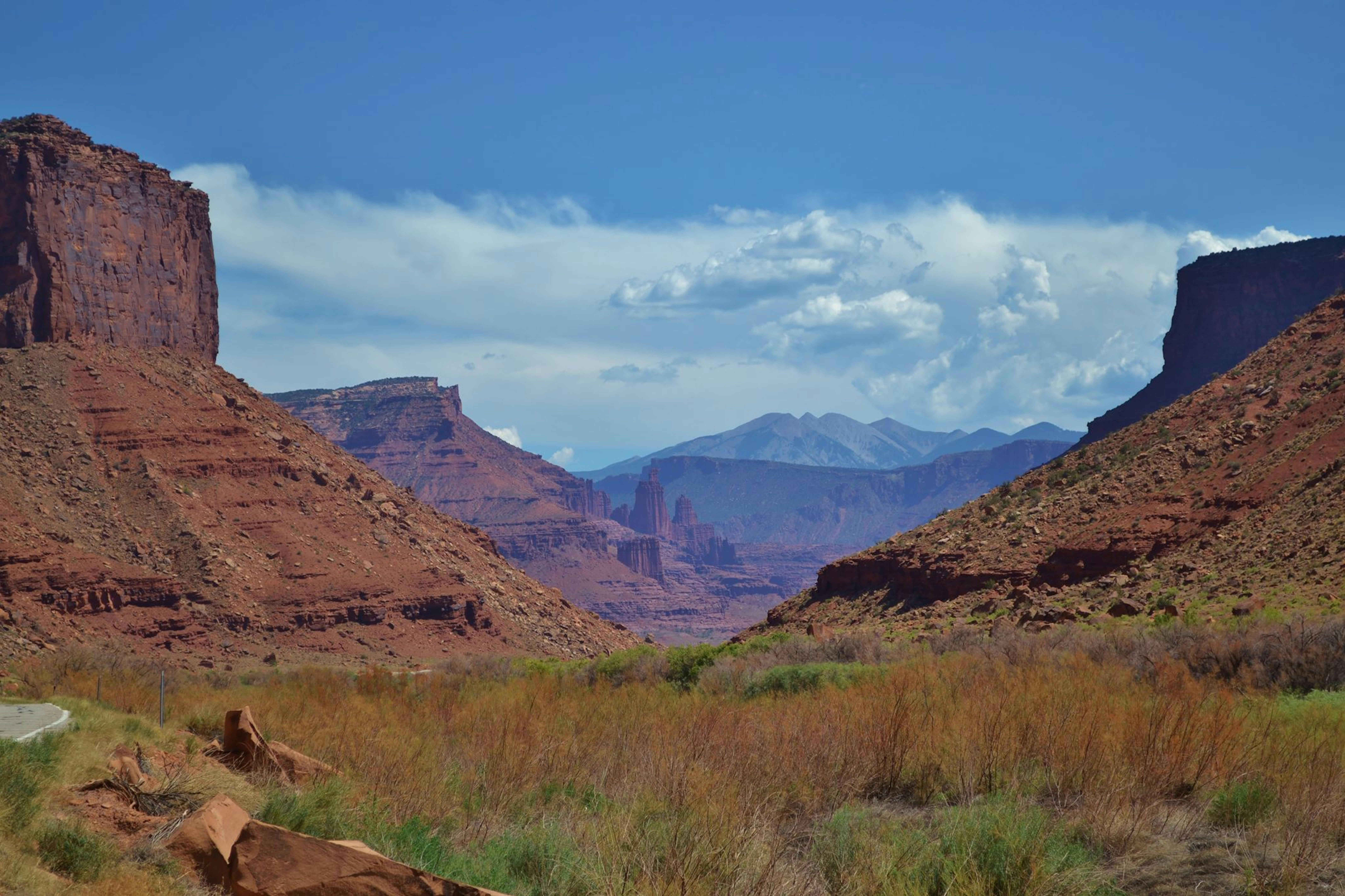 Fisher Towers rising above Highway 128 outside Moab, Utah