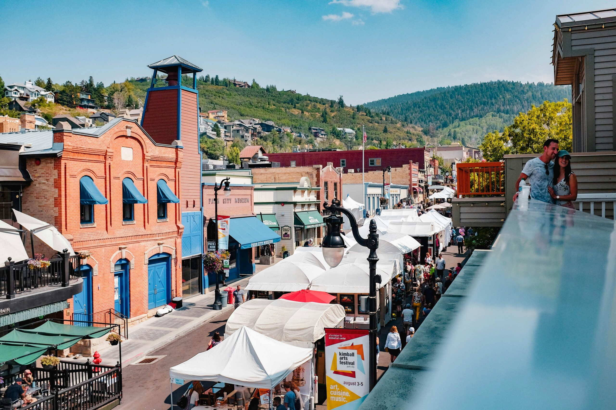 Historic Main Street in Park City, Utah, with 19th-century storefronts and mountain backdrop