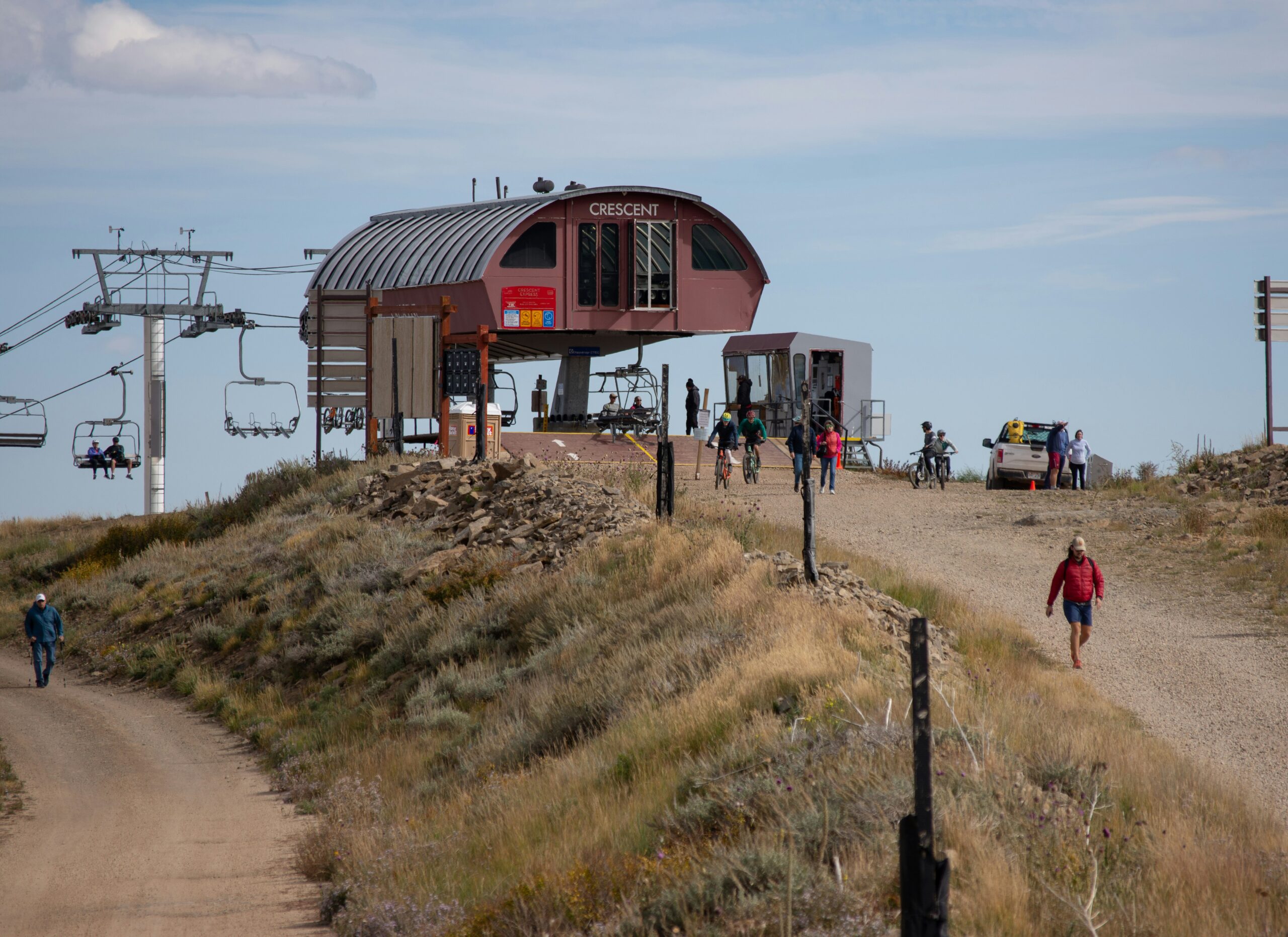 Park City Mountain Resort chairlift running above gold aspens in peak fall color