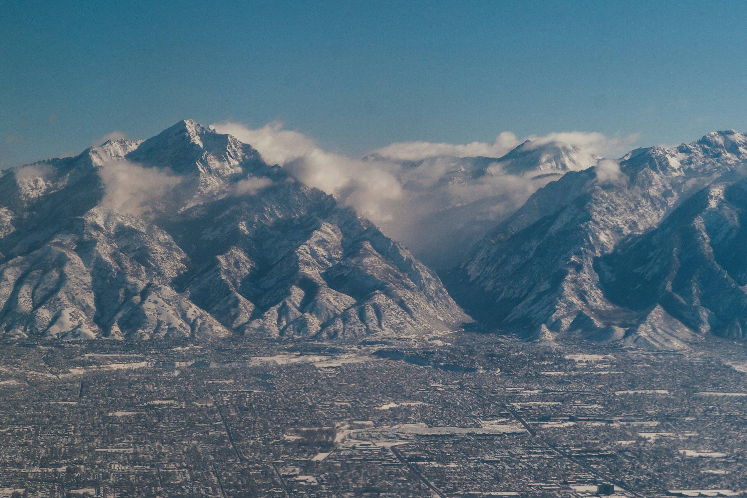Aerial view of Salt Lake City suburbs backed by the Wasatch Range in Utah