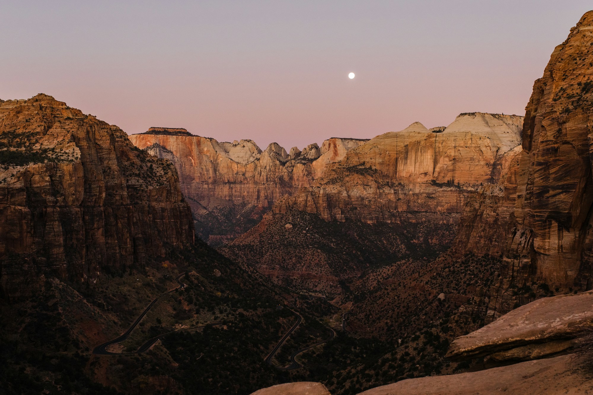 Autumn sunrise light on the red canyon walls of Zion National Park in fall